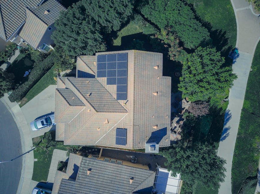 decoding-the-dollars-a-comprehensive-look-at-4kw-solar-panel-system-prices-image 4kW solar panel system on residential roof - 4kw solar panel system cost